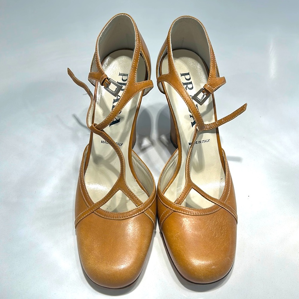 Prada wedge heel in a gorgeous calf leather.